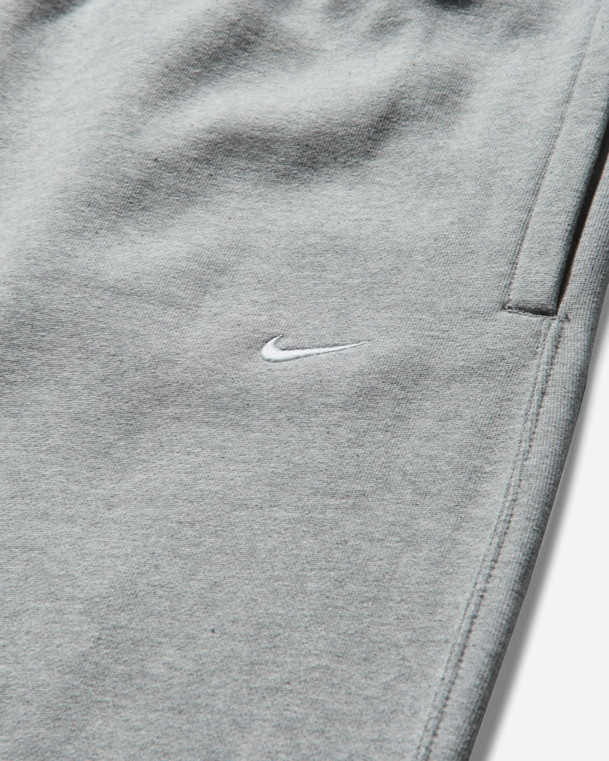 Nike Pants^Men's Solo Swoosh Open Hem Fleece Sweatpants Dark Grey Heather