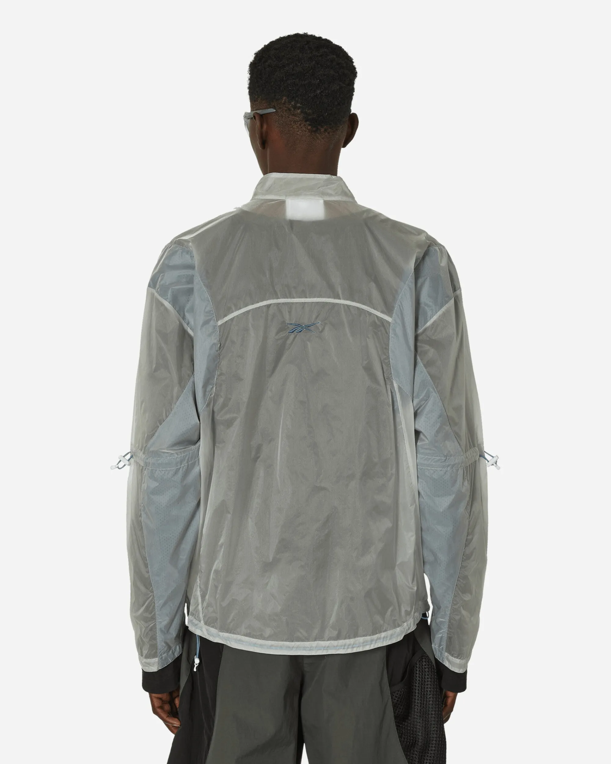Reebok Coats And Jackets^See Through Jacket Crystal Blue