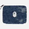 A Bathing Ape Bags And Backpacks|Bags And Backpacks^Solid Camo Denim Tech Case Light Indigo